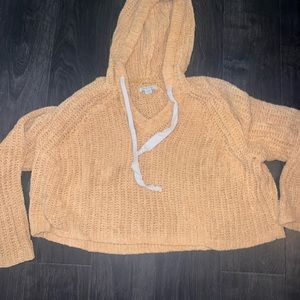 American eagle yellow sweater with a hoodie. Size small